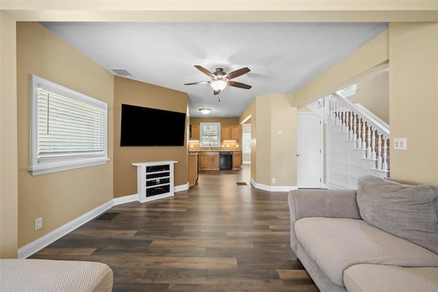102 Clarks Ln, Adams Twp, PA 16046 - living room featuring ceiling fan, stairway, and dark wood-style flooring