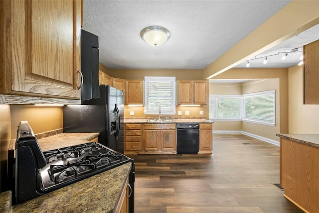 102 Clarks Ln, Adams Twp, PA 16046 - kitchen with black appliances, dark wood-type flooring, and light brown cabinetry