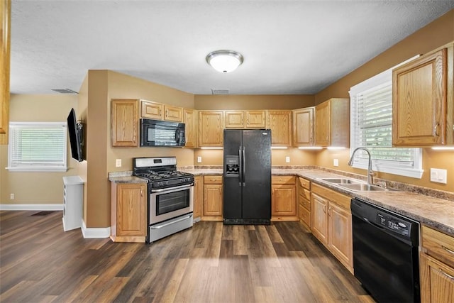 102 Clarks Ln, Adams Twp, PA 16046 - kitchen featuring black appliances, dark wood finished floors, light countertops, and light brown cabinetry
