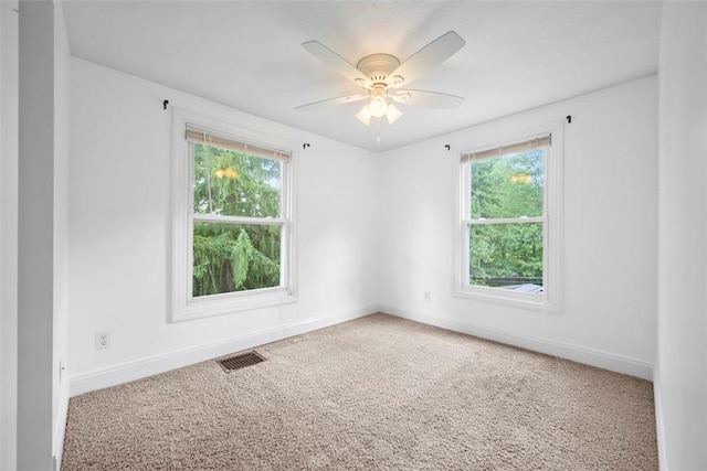 102 Clarks Ln, Adams Twp, PA 16046 - carpeted empty room with plenty of natural light and ceiling fan