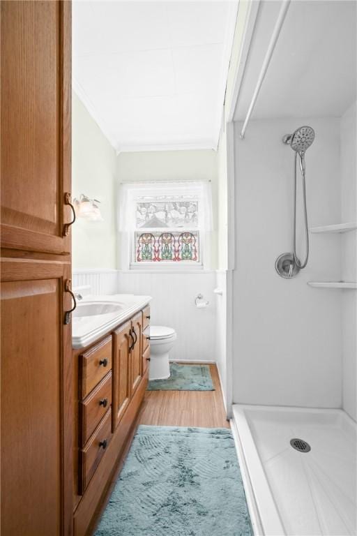 8 Harmar Dr, Cheswick, PA 15024 - bathroom with a shower stall, vanity, wood finished floors, and crown molding