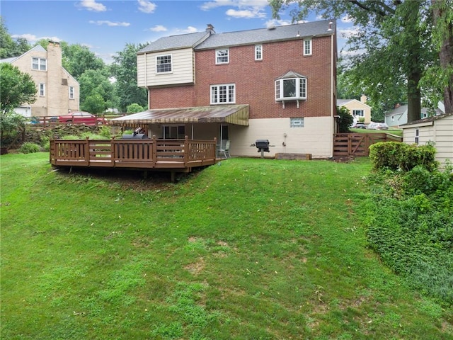 192 Glenfield Dr, Penn Hills, PA 15235 - back of property with brick siding and a deck