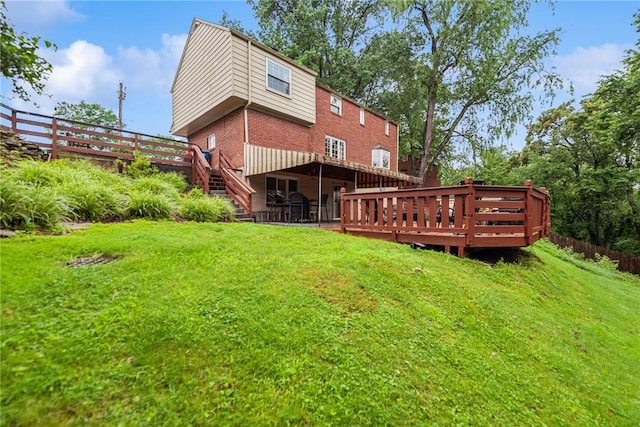 192 Glenfield Dr, Penn Hills, PA 15235 - back of property with a wooden deck, brick siding, and stairs