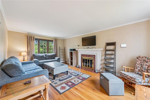 192 Glenfield Dr, Penn Hills, PA 15235 - living area featuring wood finished floors, crown molding, and a brick fireplace