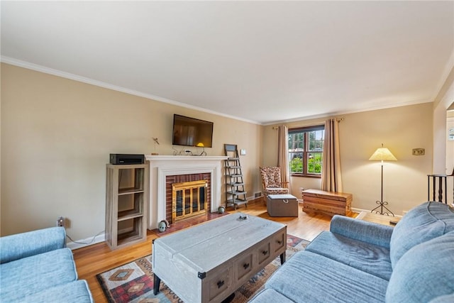 192 Glenfield Dr, Penn Hills, PA 15235 - living area featuring ornamental molding, light wood-style floors, and a brick fireplace