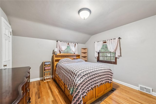 192 Glenfield Dr, Penn Hills, PA 15235 - bedroom with light wood-style floors and lofted ceiling