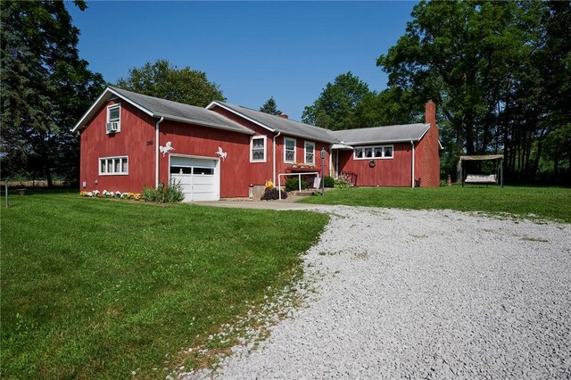 2583 State Route 210, Cowanshanock Twp, PA 16249 - single story home with driveway, a front yard, and a garage
