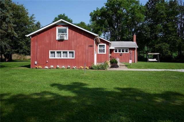 2583 State Route 210, Cowanshanock Twp, PA 16249 - view of home's exterior with a yard and a chimney