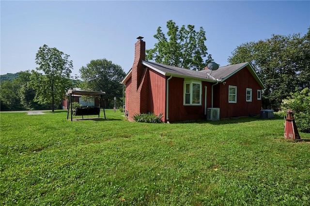 2583 State Route 210, Cowanshanock Twp, PA 16249 - view of side of home with a chimney, a lawn, and a pergola