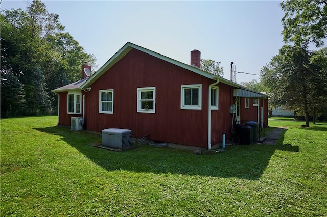 2583 State Route 210, Cowanshanock Twp, PA 16249 - view of home's exterior with a chimney and a yard