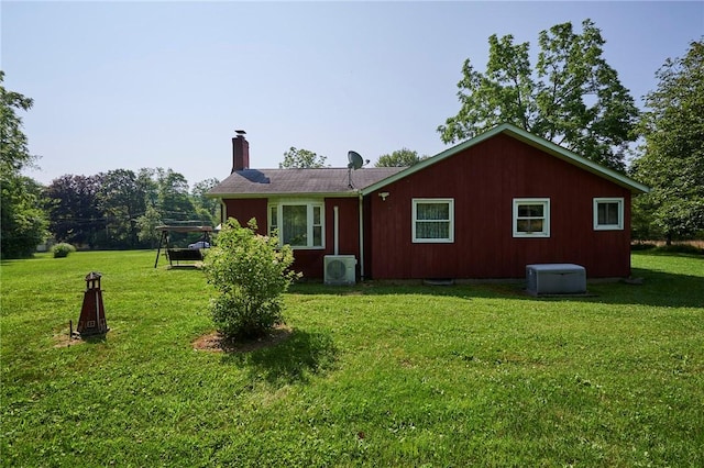 2583 State Route 210, Cowanshanock Twp, PA 16249 - rear view of house featuring a lawn and a chimney