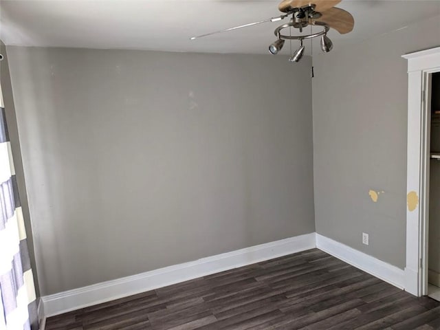 413 N 3rd St, Jeannette, PA 15644 - empty room with ceiling fan and dark wood-type flooring