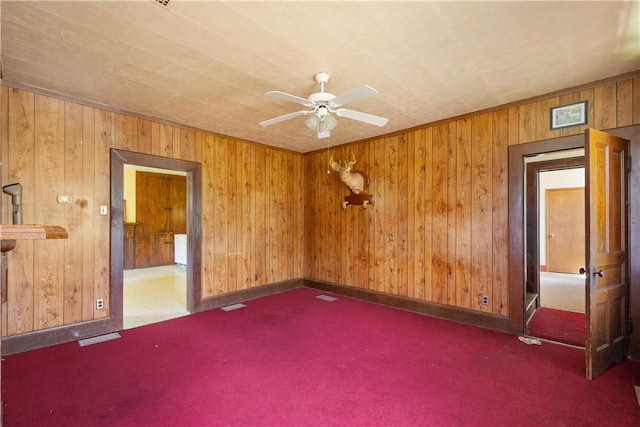 481 Dille Run Rd, Morris Twp, PA 15329 - unfurnished room with ceiling fan, wood walls, and carpet