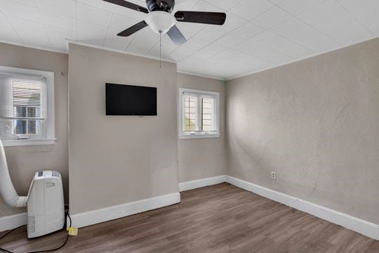 1850 Middle St, Sharpsburg, PA 15215 - unfurnished room featuring ceiling fan, wood finished floors, and ornamental molding