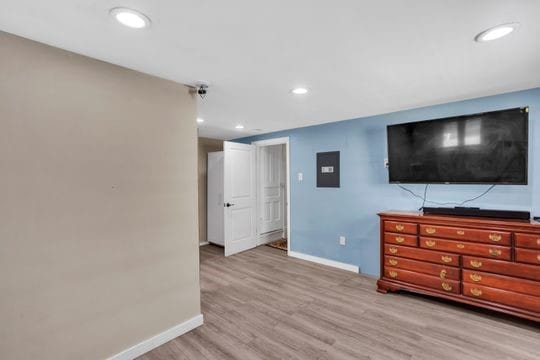 1850 Middle St, Sharpsburg, PA 15215 - living room featuring wood finished floors and recessed lighting
