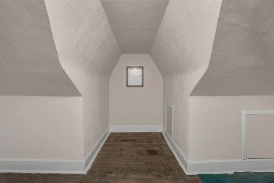 1850 Middle St, Sharpsburg, PA 15215 - additional living space with lofted ceiling, wood finished floors, and a textured ceiling
