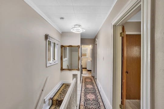 1850 Middle St, Sharpsburg, PA 15215 - hall featuring ornamental molding and baseboards