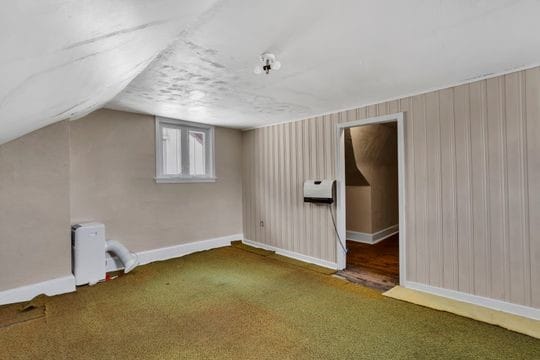 1850 Middle St, Sharpsburg, PA 15215 - additional living space with carpet flooring and vaulted ceiling