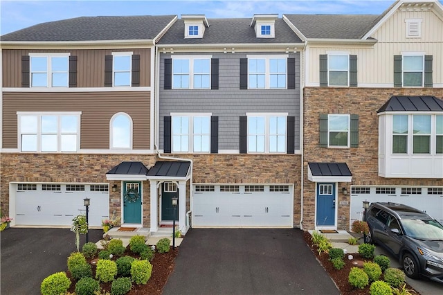 1208 Clear Springs Dr, Cecil, PA 15317 - townhome / multi-family property featuring stone siding and asphalt driveway