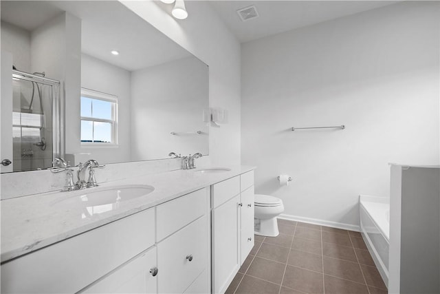 1208 Clear Springs Dr, Cecil, PA 15317 - bathroom with a garden tub, a shower stall, double vanity, and tile patterned floors