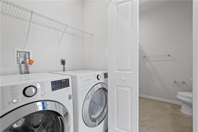 1208 Clear Springs Dr, Cecil, PA 15317 - laundry room with washing machine and dryer and tile patterned flooring