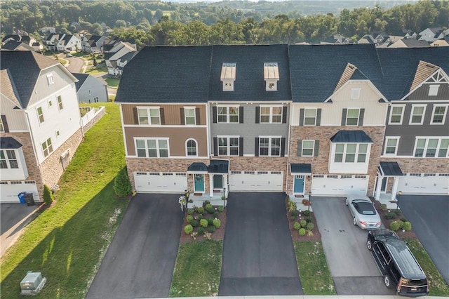 1208 Clear Springs Dr, Cecil, PA 15317 - view of front of property with an attached garage, a residential view, and driveway