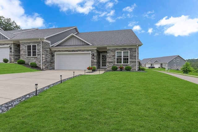 113 Dano Dr Unit 37, Ohioville, PA 15009 - craftsman-style home featuring stone siding, a garage, concrete driveway, and a front yard