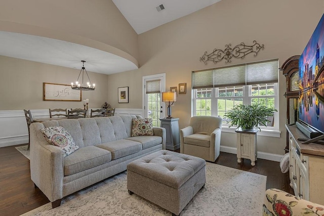 113 Dano Dr Unit 37, Ohioville, PA 15009 - living room with dark wood-type flooring, a chandelier, high vaulted ceiling, and a wainscoted wall