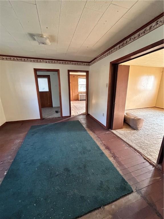 431 Washington Ave, Leechburg Boro, PA 15656 - empty room with baseboards and radiator