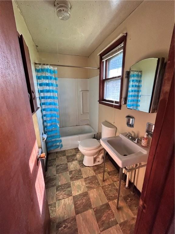 431 Washington Ave, Leechburg Boro, PA 15656 - bathroom with shower / bath combo with shower curtain and tile patterned floors