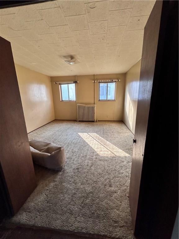 431 Washington Ave, Leechburg Boro, PA 15656 - carpeted spare room featuring radiator