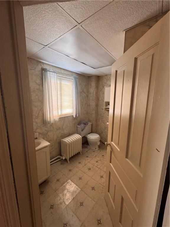 431 Washington Ave, Leechburg Boro, PA 15656 - bathroom featuring radiator, vanity, and tile patterned floors
