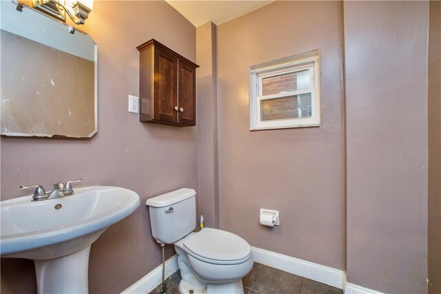 118 S 17th St, South Side, PA 15203 - half bathroom with toilet and tile patterned flooring