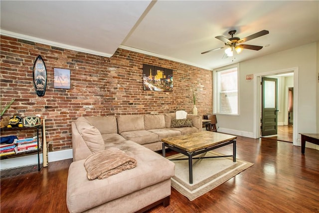 118 S 17th St, South Side, PA 15203 - living room featuring ceiling fan, wood finished floors, and brick wall