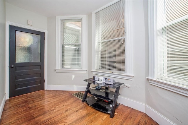 118 S 17th St, South Side, PA 15203 - entryway featuring wood finished floors and baseboards