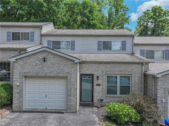 108 Arthur Ct, Richland, PA 15044 - view of front facade with a garage, driveway, and brick siding