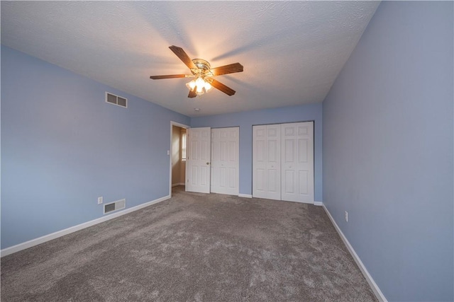 108 Arthur Ct, Richland, PA 15044 - unfurnished bedroom with two closets, carpet floors, and a ceiling fan