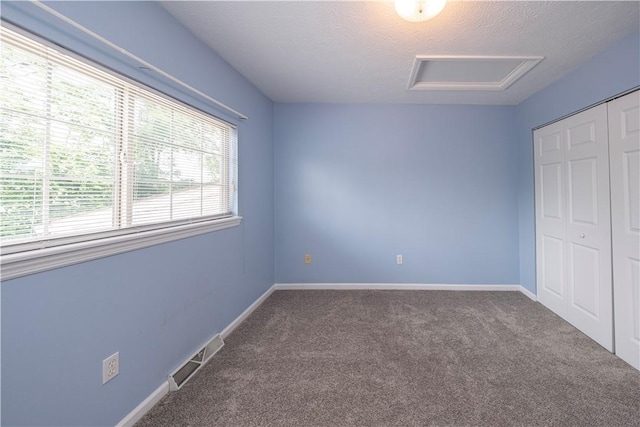 108 Arthur Ct, Richland, PA 15044 - unfurnished bedroom with attic access, carpet flooring, a closet, and a textured ceiling
