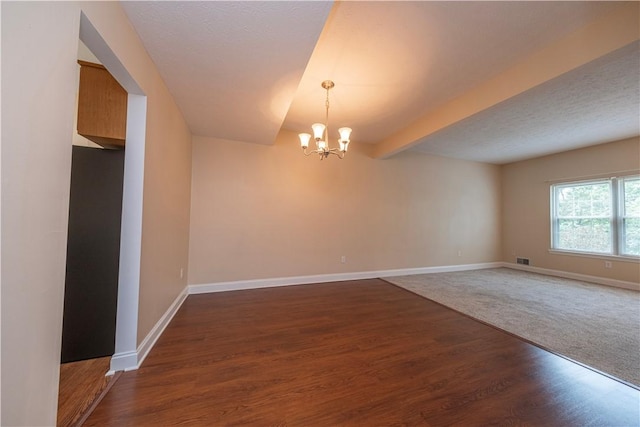 108 Arthur Ct, Richland, PA 15044 - spare room featuring a chandelier, dark wood finished floors, and beamed ceiling