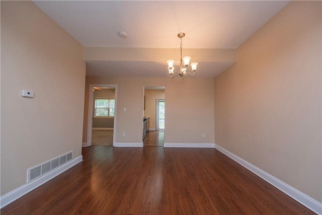 108 Arthur Ct, Richland, PA 15044 - spare room with dark wood finished floors, a chandelier, and a smoke detector