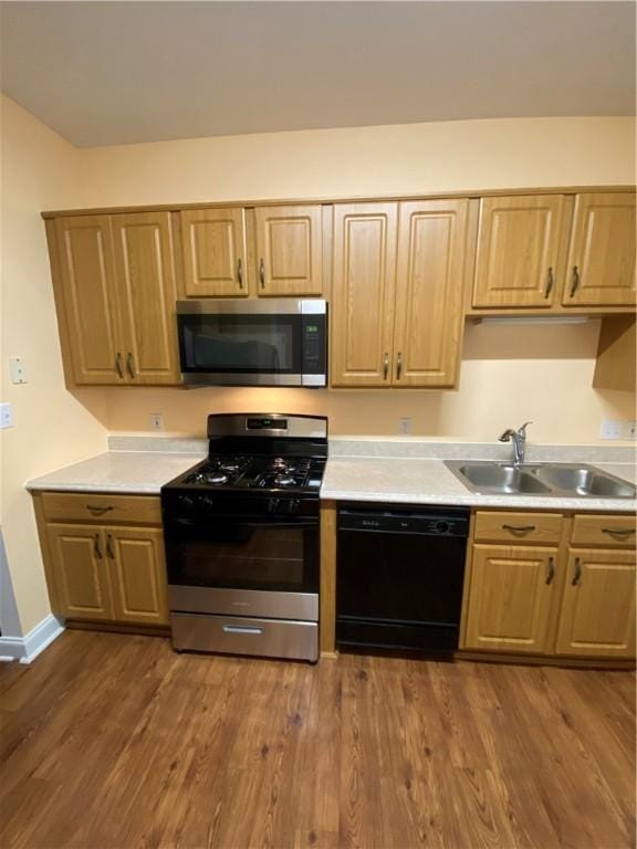 108 Arthur Ct, Richland, PA 15044 - kitchen featuring stainless steel appliances, light countertops, and dark wood finished floors
