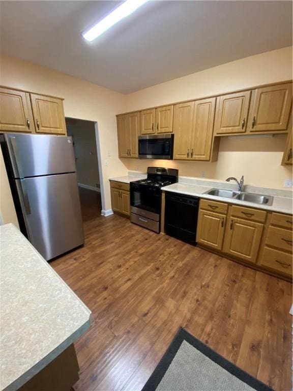 108 Arthur Ct, Richland, PA 15044 - kitchen featuring appliances with stainless steel finishes, dark wood-style floors, light countertops, and light brown cabinetry
