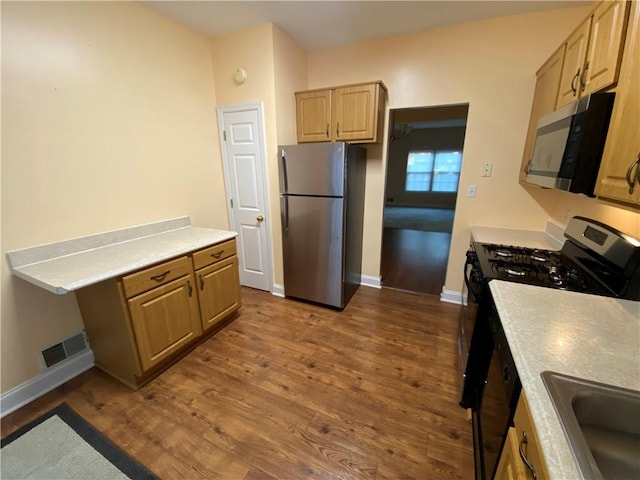 108 Arthur Ct, Richland, PA 15044 - kitchen with appliances with stainless steel finishes, dark wood finished floors, and light countertops