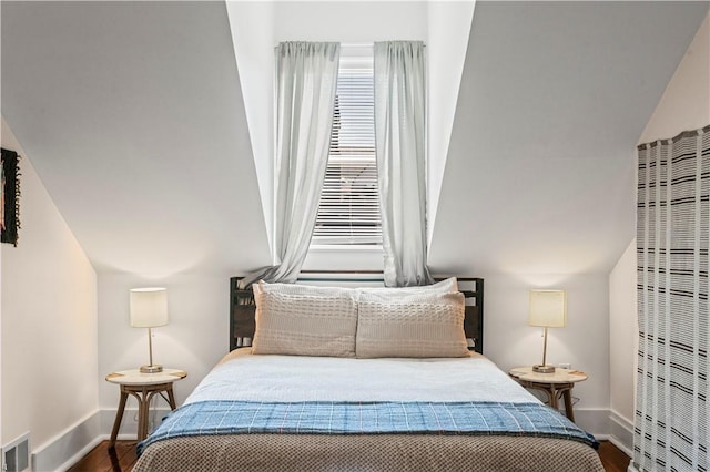 175-177 43rd 1/2 St, Lawrenceville, PA 15201 - bedroom with wood finished floors, a heating unit, and lofted ceiling