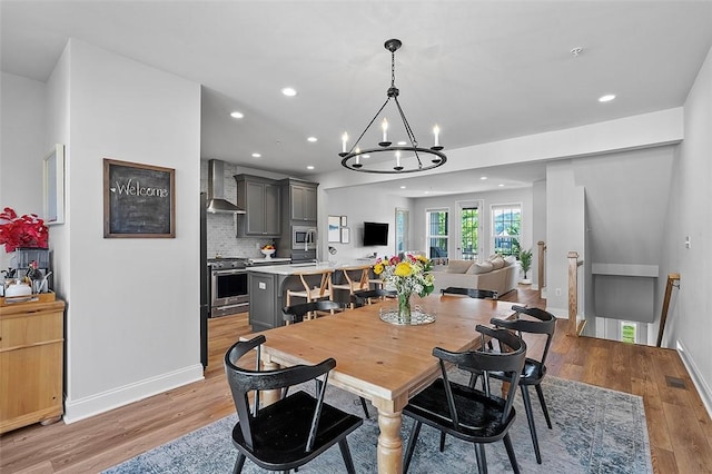 3155 Preston Way, Bridgeville, PA 15017 - dining space with light wood-type flooring, recessed lighting, and a chandelier
