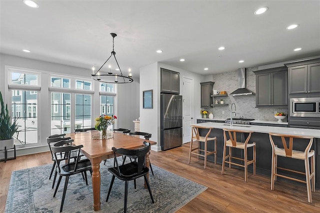 3155 Preston Way, Bridgeville, PA 15017 - dining space featuring a chandelier, wood finished floors, and recessed lighting