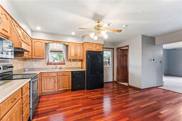358 Shannon Cir, Daugherty Twp, PA 15066 - kitchen with black appliances, dark wood-style flooring, tasteful backsplash, and recessed lighting