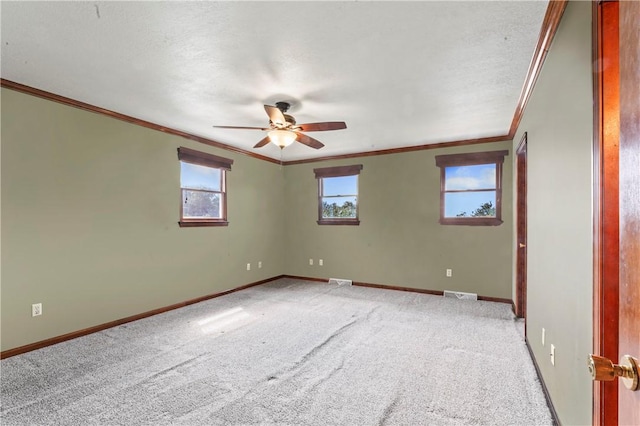 358 Shannon Cir, Daugherty Twp, PA 15066 - empty room featuring crown molding, a ceiling fan, light colored carpet, and a textured ceiling