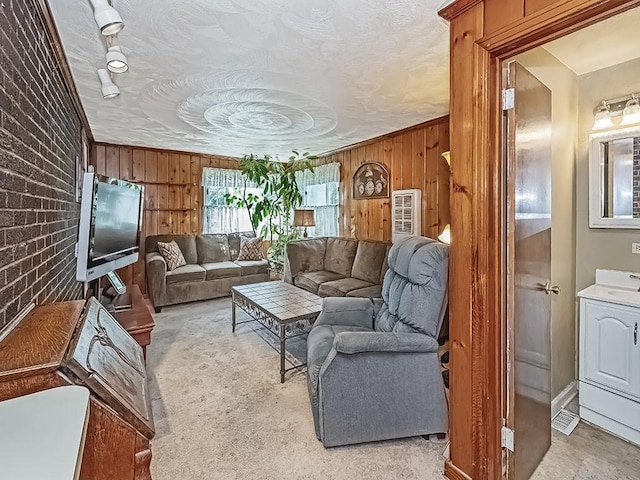 740 Churchill Ave, Penn Hills, PA 15235 - living room with wood walls and brick wall