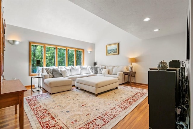 268 Glade Mills Rd, Middlesex Twp, PA 16059 - living area featuring vaulted ceiling, wood finished floors, and recessed lighting